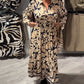 Robe chemise vintage à fleurs avec boutonnage à la taille