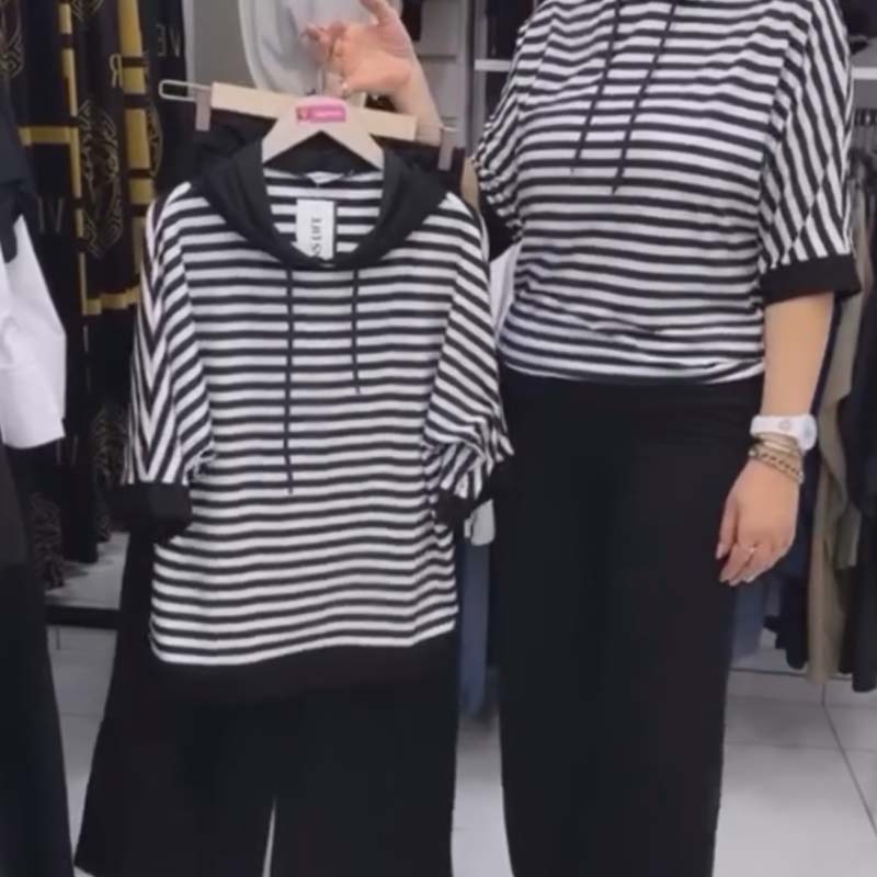 Ensemble pour femme : haut rayé et pantalon de couleur unie