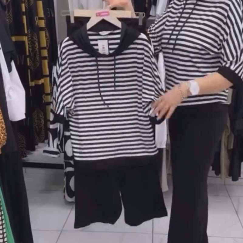 Ensemble pour femme : haut rayé et pantalon de couleur unie
