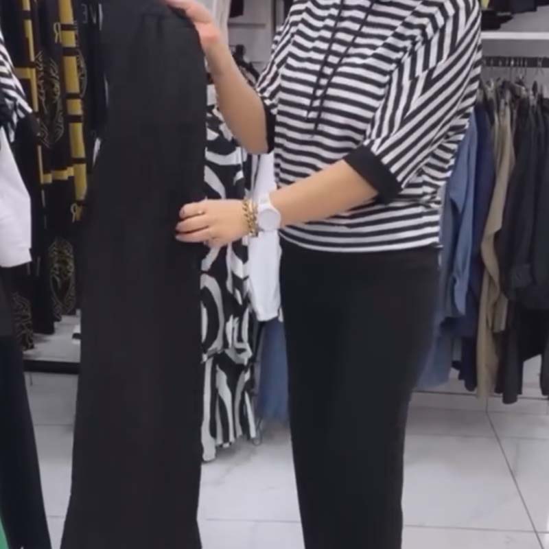 Ensemble pour femme : haut rayé et pantalon de couleur unie