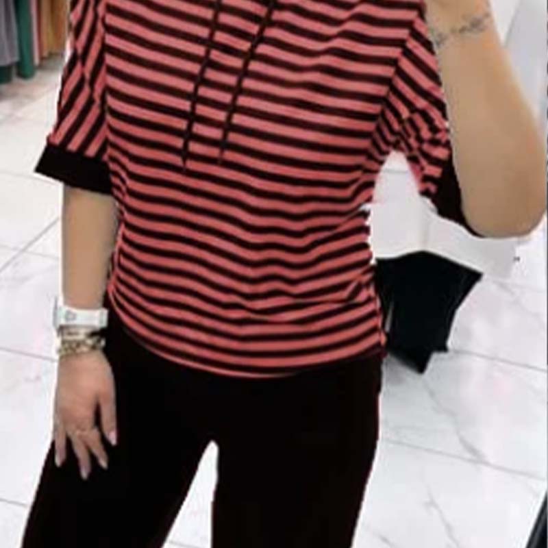 Ensemble pour femme : haut rayé et pantalon de couleur unie
