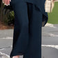 Conjunto encantador de blusa irregular e calça pantalona